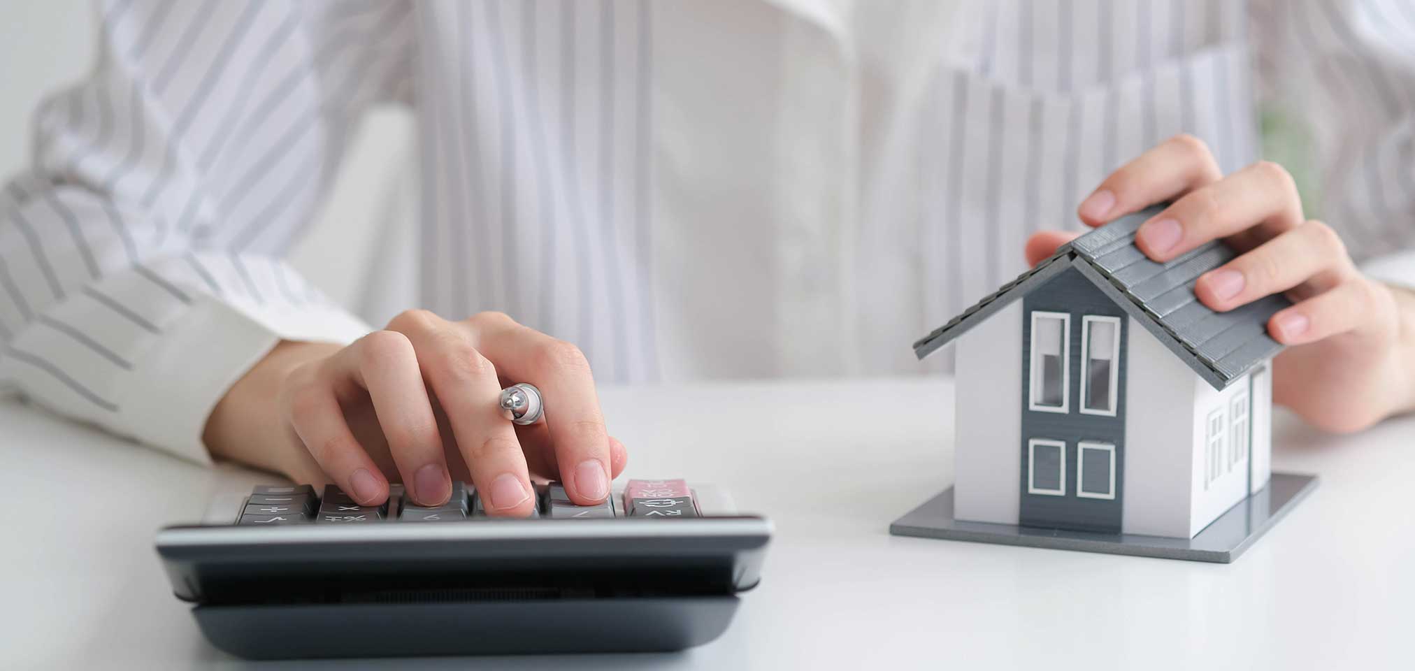 image of a man signing a form